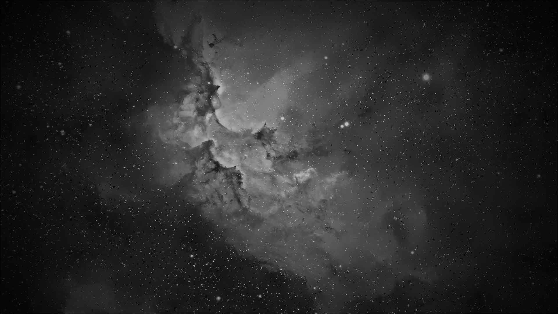 Eagle Nebula, showcasing its intricate structures and cosmic dust formations.