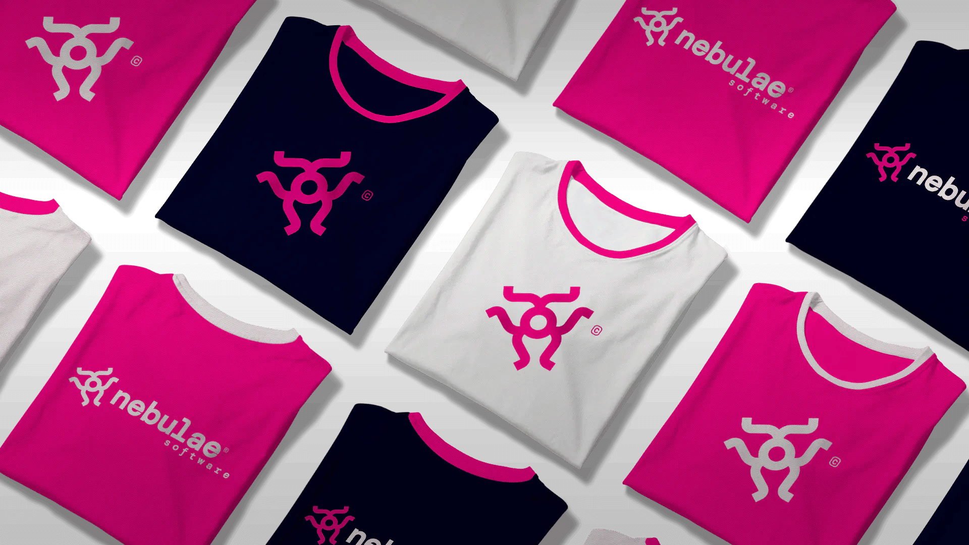Flat lay of colorful t-shirts with the Nebulae Software logo on different backgrounds.
