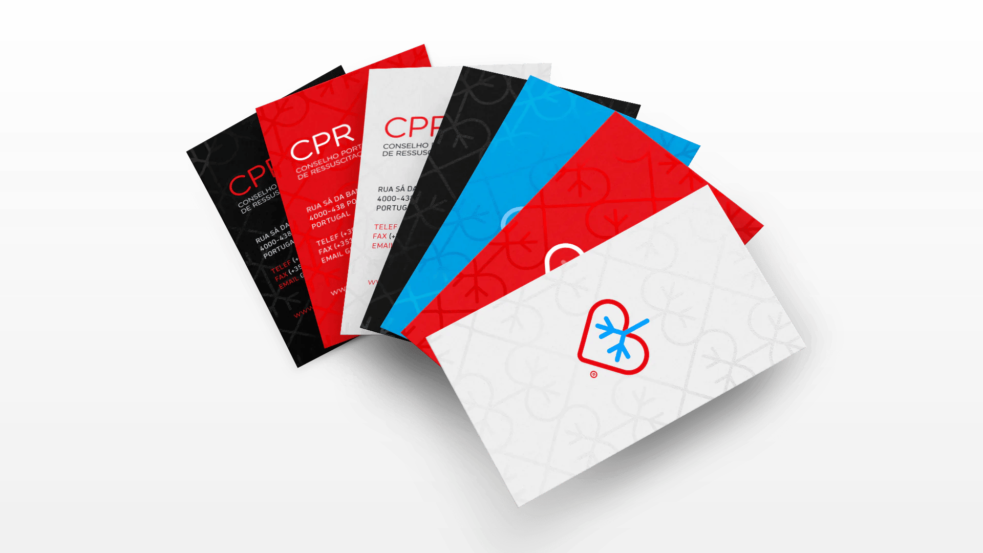 Stack of CPR business cards in red, black, and blue.