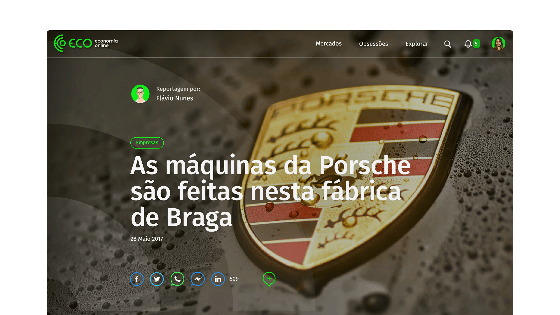Close-up of Porsche logo with article headline on manufacturing in Braga.